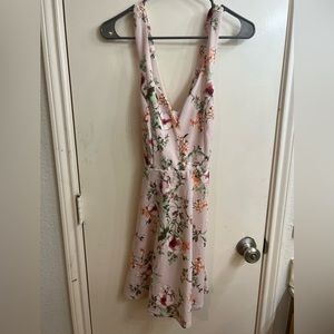 NWT pink floral Trixxi mini dress size medium with crossed straps in the back